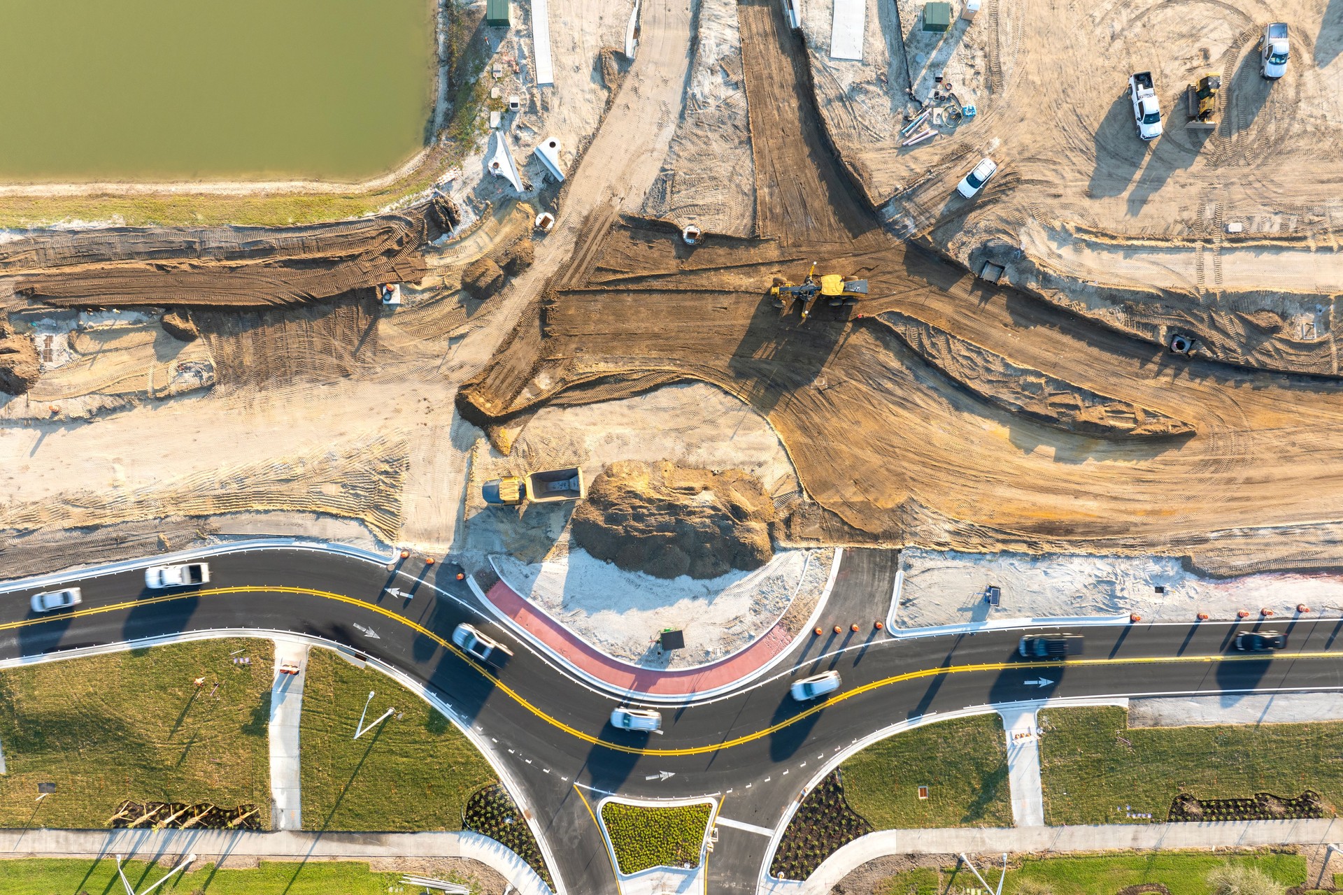 Industrial roadworks. Roundabout on wide American highway under construction. Development of transportation system for rapid transit
